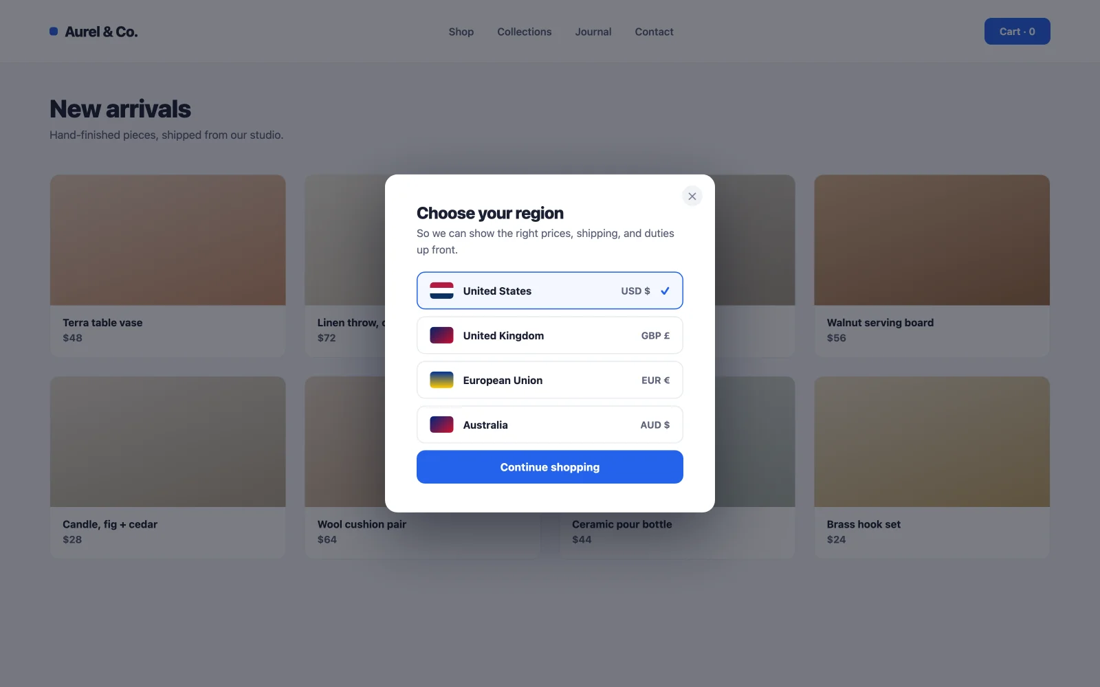 Location and currency selector popup example shown to first time international visitors