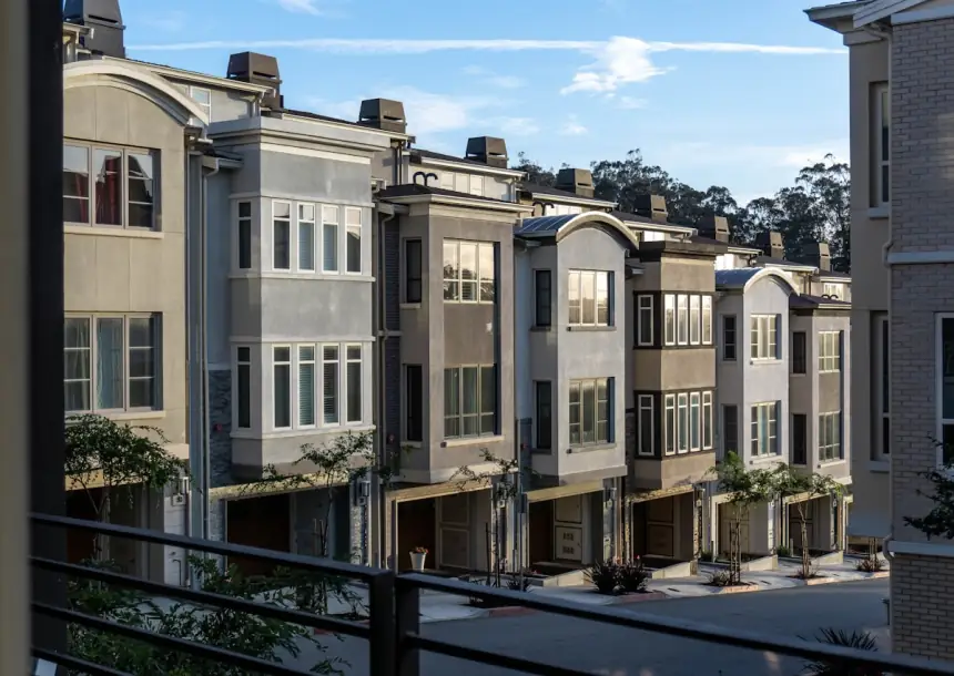 Traditional townhouse facade with white trim