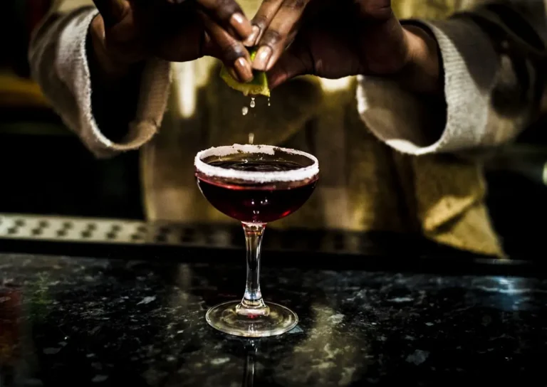 Signature cocktail in a coupe glass