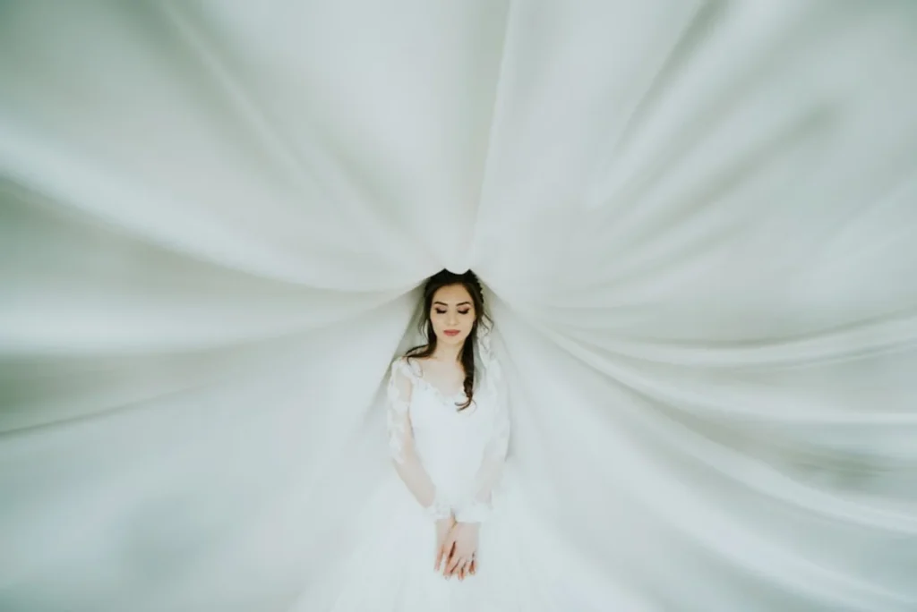 Bride portrait with bouquet outdoors