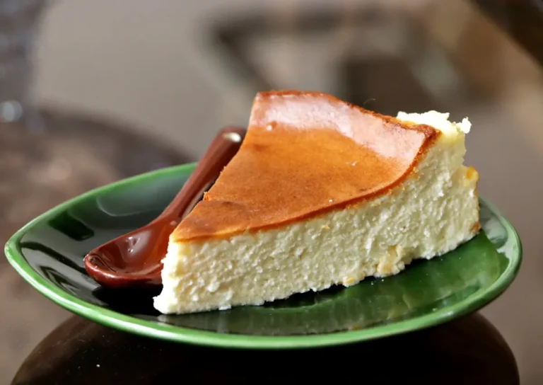 Burnt Basque cheesecake slice on a green plate