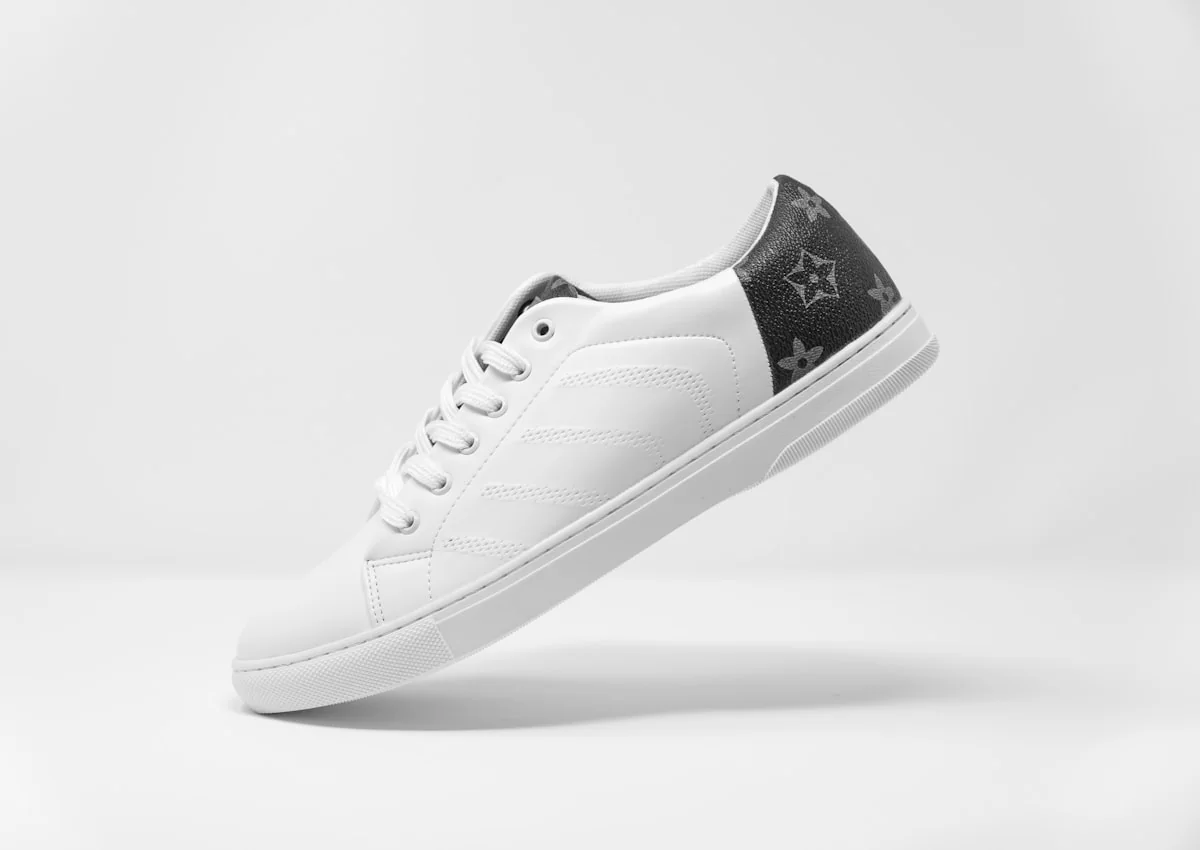 White court sneaker on a studio background