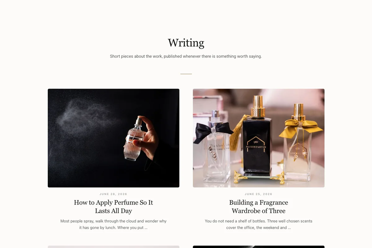 Plain minimal Elementor blog page template with centred two column cards and serif headlines