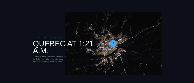 Aperture Index scroll effect for Elementor showing a night photograph of city lights with its title laid across the frame
